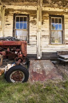 Old tractor on an old farm in Maine, USA