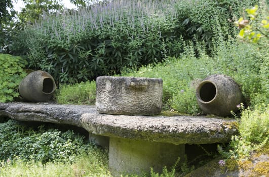 english garden with vases for plants and as decoration