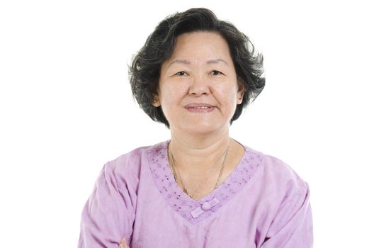 Portrait of 60s Asian senior adult woman smiling, isolated on white background.