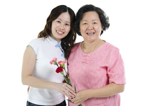 Portrait of Asian senior parent and adult daughter, celebrating mothers day, isolated on white background.