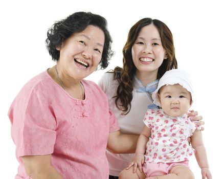 Portrait of happy three generations Asian family, grandmother, mother and grandchild, isolated on white background.