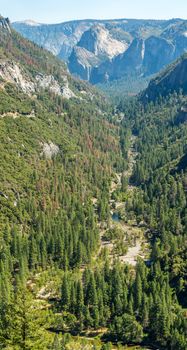 A view of Yosemite Valley from Big Oak Flat Road east towards Cathedral Rocks and Bridalveil Falls.