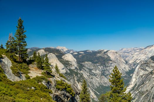 Tenaya Canyon is a dramatic and dangerous canyon in Yosemite National Park, California, USA, that runs from the outlet of Tenaya Lake 10 miles down to Yosemite Valley.