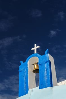 Blue and white orthodox church bell tower. Oia, Santorini Greece. Copyspace