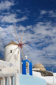 View of Oia windmill at the Island Santorini, Greece. Lot of copyspace.