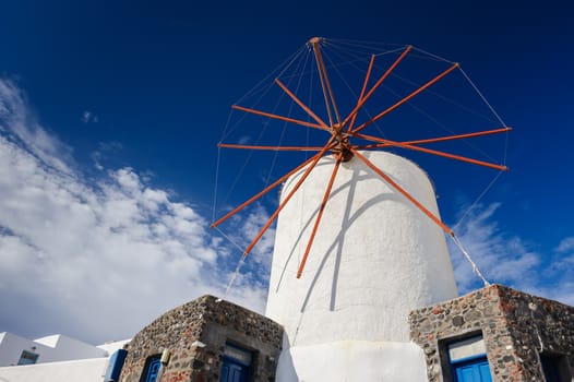 View of Oia windmill at the Island Santorini, Greece. Lot of copyspace.