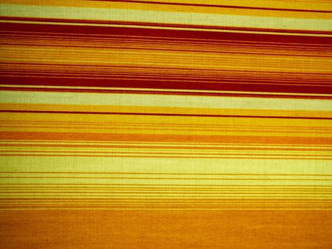 Fabric Cloth Texture Background in bright yellow red orange colors