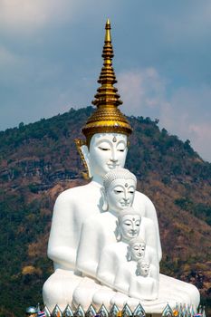 Phetchabun, Thailand - February 23.2017: Buddha statues and colored foot path colorful glass stacked in Wat Pha Kaew, Khao Kho, Phetchabun on February 23.2017 at Thailand.There. A famous Buddhist temple.