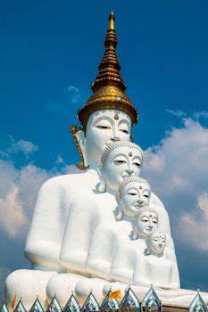 Phetchabun, Thailand - February 23.2017: Buddha statues and colored foot path colorful glass stacked in Wat Pha Kaew, Khao Kho, Phetchabun on February 23.2017 at Thailand.There. A famous Buddhist temple.