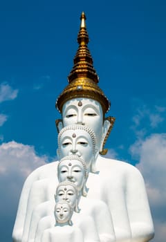 Phetchabun, Thailand - February 23.2017: Buddha statues and colored foot path colorful glass stacked in Wat Pha Kaew, Khao Kho, Phetchabun on February 23.2017 at Thailand.There. A famous Buddhist temple.