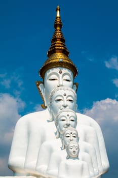 Phetchabun, Thailand - February 23.2017: Buddha statues and colored foot path colorful glass stacked in Wat Pha Kaew, Khao Kho, Phetchabun on February 23.2017 at Thailand.There. A famous Buddhist temple.