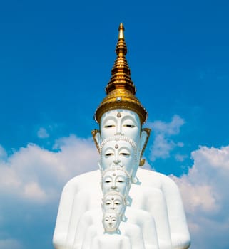 Phetchabun, Thailand - February 23.2017: Buddha statues and colored foot path colorful glass stacked in Wat Pha Kaew, Khao Kho, Phetchabun on February 23.2017 at Thailand.There. A famous Buddhist temple.