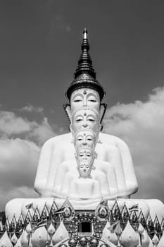 Phetchabun, Thailand - February 23.2017: Buddha statues and colored foot path colorful glass stacked in Wat Pha Kaew, Khao Kho, Phetchabun on February 23.2017 at Thailand.There. A famous Buddhist temple.