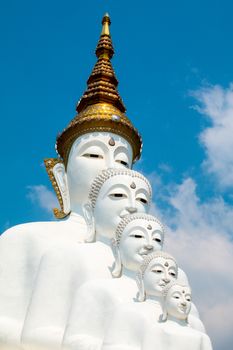 Phetchabun, Thailand - February 23.2017: Buddha statues and colored foot path colorful glass stacked in Wat Pha Kaew, Khao Kho, Phetchabun on February 23.2017 at Thailand.There. A famous Buddhist temple.