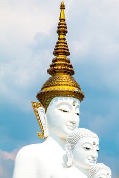 Phetchabun, Thailand - February 23.2017: Buddha statues and colored foot path colorful glass stacked in Wat Pha Kaew, Khao Kho, Phetchabun on February 23.2017 at Thailand.There. A famous Buddhist temple.