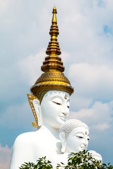 Phetchabun, Thailand - February 23.2017: Buddha statues and colored foot path colorful glass stacked in Wat Pha Kaew, Khao Kho, Phetchabun on February 23.2017 at Thailand.There. A famous Buddhist temple.