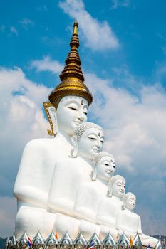 Phetchabun, Thailand - February 23.2017: Buddha statues and colored foot path colorful glass stacked in Wat Pha Kaew, Khao Kho, Phetchabun on February 23.2017 at Thailand.There. A famous Buddhist temple.