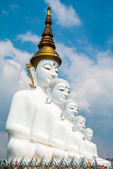 Phetchabun, Thailand - February 23.2017: Buddha statues and colored foot path colorful glass stacked in Wat Pha Kaew, Khao Kho, Phetchabun on February 23.2017 at Thailand.There. A famous Buddhist temple.