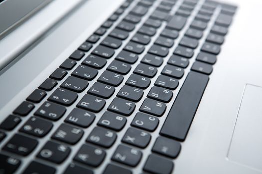 gray laptop on a table on close up