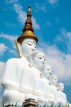 Phetchabun, Thailand - February 23.2017: Buddha statues and colored foot path colorful glass stacked in Wat Pha Kaew, Khao Kho, Phetchabun on February 23.2017 at Thailand.There. A famous Buddhist temple.