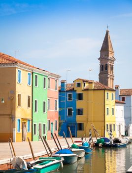 Burano Isle, close to Venice. Traditional colored houses during a sunny day.