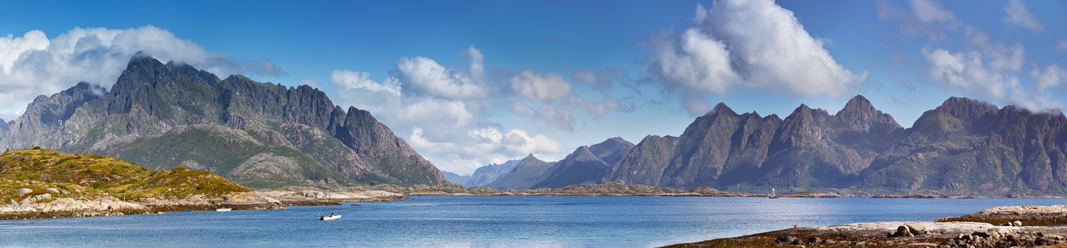 Norway landscape sunny summer panorama, fjord and mountains in the background