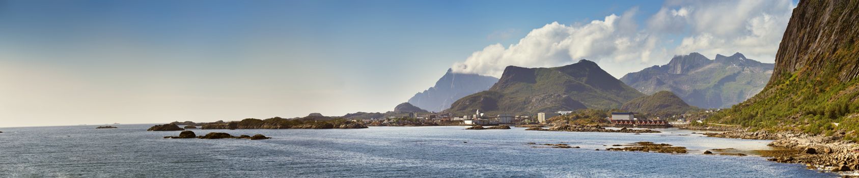 Norway landscape sunny summer panorama, fjord and mountains in the background