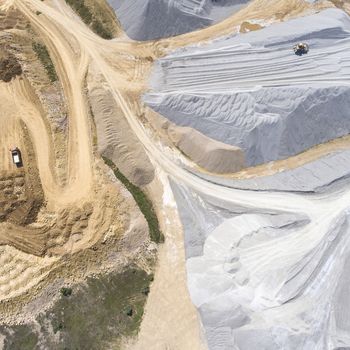 Aerial view over the building materials processing factory. Sand mine. View from above.