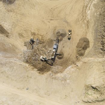 Aerial view over the building materials processing factory. Sand mine. View from above.