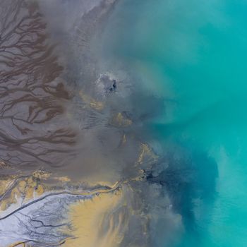 Degraded landscape in Poland. Destroyed land. View from above. Surrealistic lake.