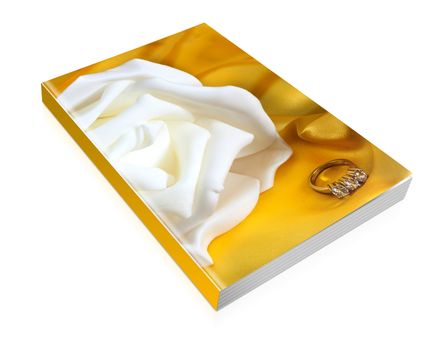 book of  wedding rings on  a yellow fabric background