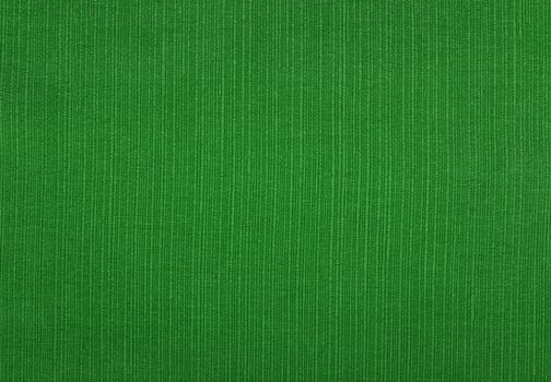 Forest green coarse woven fabric abstract background texture showing warp and weft