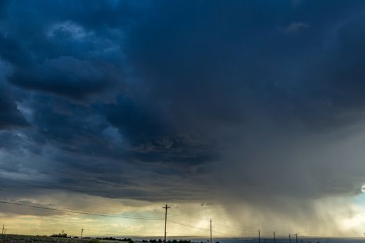 In meteorology, virga is an observable streak or shaft of precipitation that falls from a cloud but evaporates or sublimates before reaching the ground.