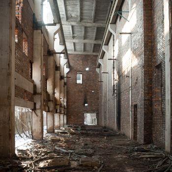 discarded ruin with old windows and wall, industrial window in concrete wall