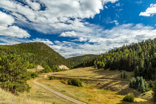 The Enchanted Circle Scenic Byway is an 84 mile New Mexico Scenic Byway and National Forest Scenic Byway around Wheeler Mountain located in Northern New Mexico. It begins and ends in Taos, New Mexico.