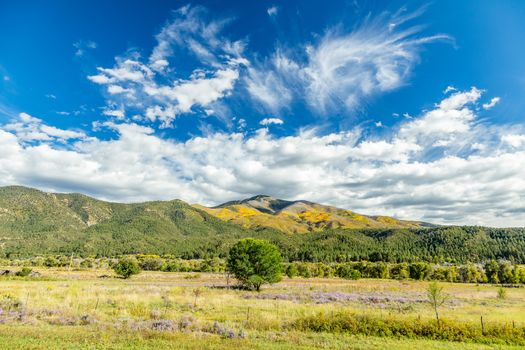 The Enchanted Circle Scenic Byway is an 84 mile New Mexico Scenic Byway and National Forest Scenic Byway around Wheeler Mountain located in Northern New Mexico. It begins and ends in Taos, New Mexico.