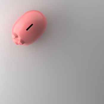 TOP VIEW OF PIGGY BANK ON WHITE BACKGROUND