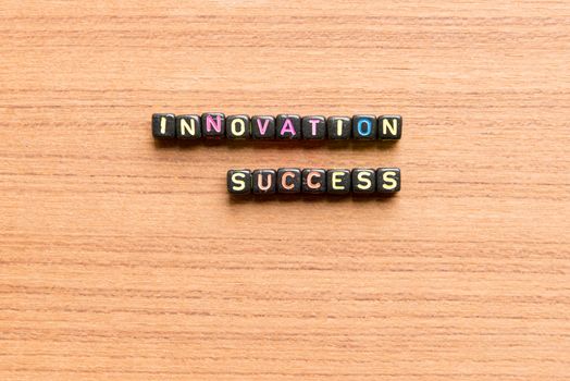 innovation success words in wooden background