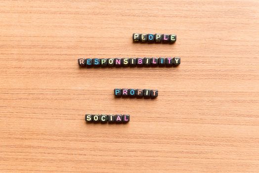 people responsibility profit social words in wooden background