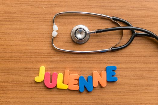julienne colorful word with Stethoscope on wooden background
