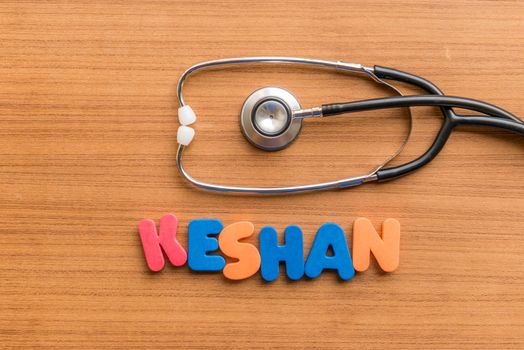 Keshan colorful word with Stethoscope on wooden background