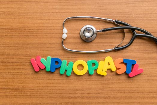 kyphoplasty colorful word with Stethoscope on wooden background
