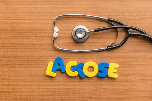 lactose colorful word with Stethoscope on wooden background