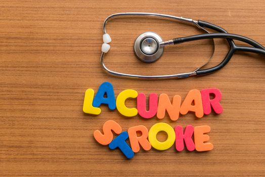 lacunar stroke colorful word with Stethoscope on wooden background