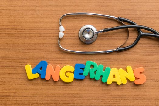 Langerhans colorful word with Stethoscope on wooden background