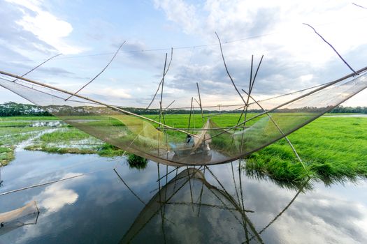 Gopalgonj, Bangladesh - September 18, 2016: fishnet with fisherman at Gopalgonj, Bangladesh