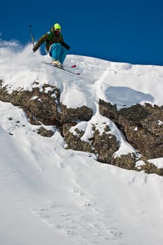 Freerider jumping from the steep