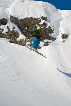 Freerider jumping from the steep