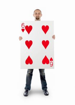 Businessman with large playing card - Six of hearts