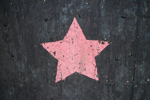 five-pointed star on a dark background symbol of Satan